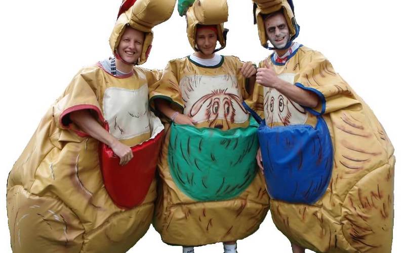 3 people wearing inflatable kangaroo costumes, with red green and blue pouches