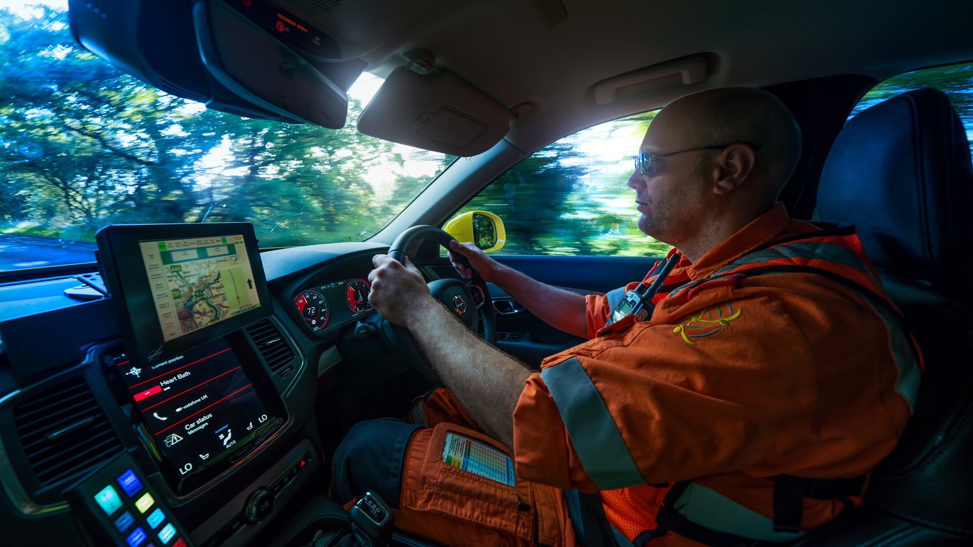 A paramedic driving the critical care car