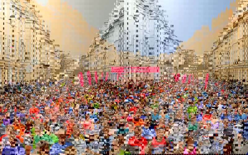 A very large group of runners through Bath