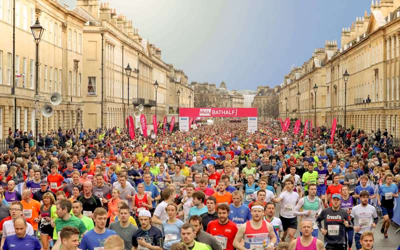 A very large group of runners through Bath