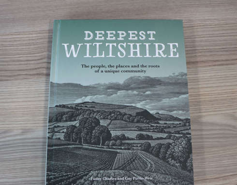A Deepest Wiltshire book on a wooden table.