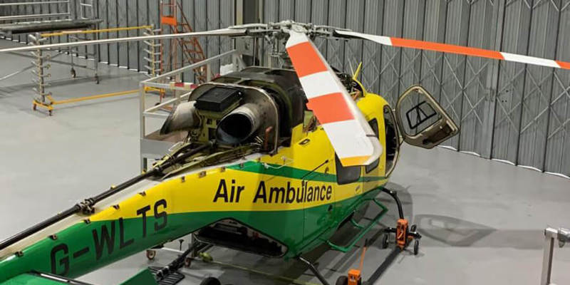 The Bell-429 helicopter with it's engines exposed whilst having repairs work.
