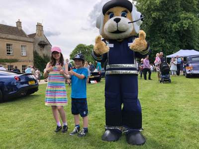 Children posing with mascot Marsha at Middlewick House Open Gardens