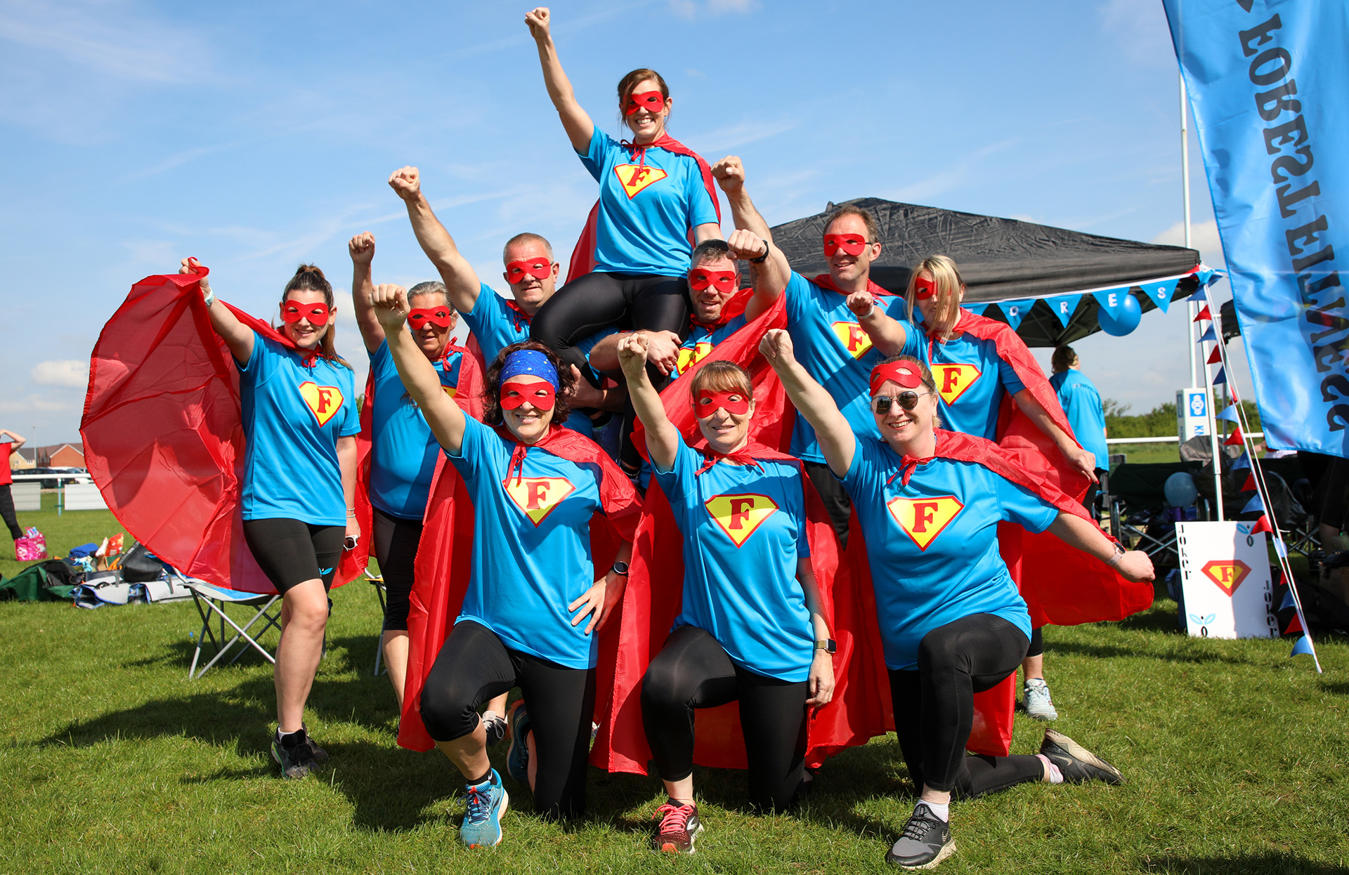 A team dressed as superheroes for It's a Knockout event