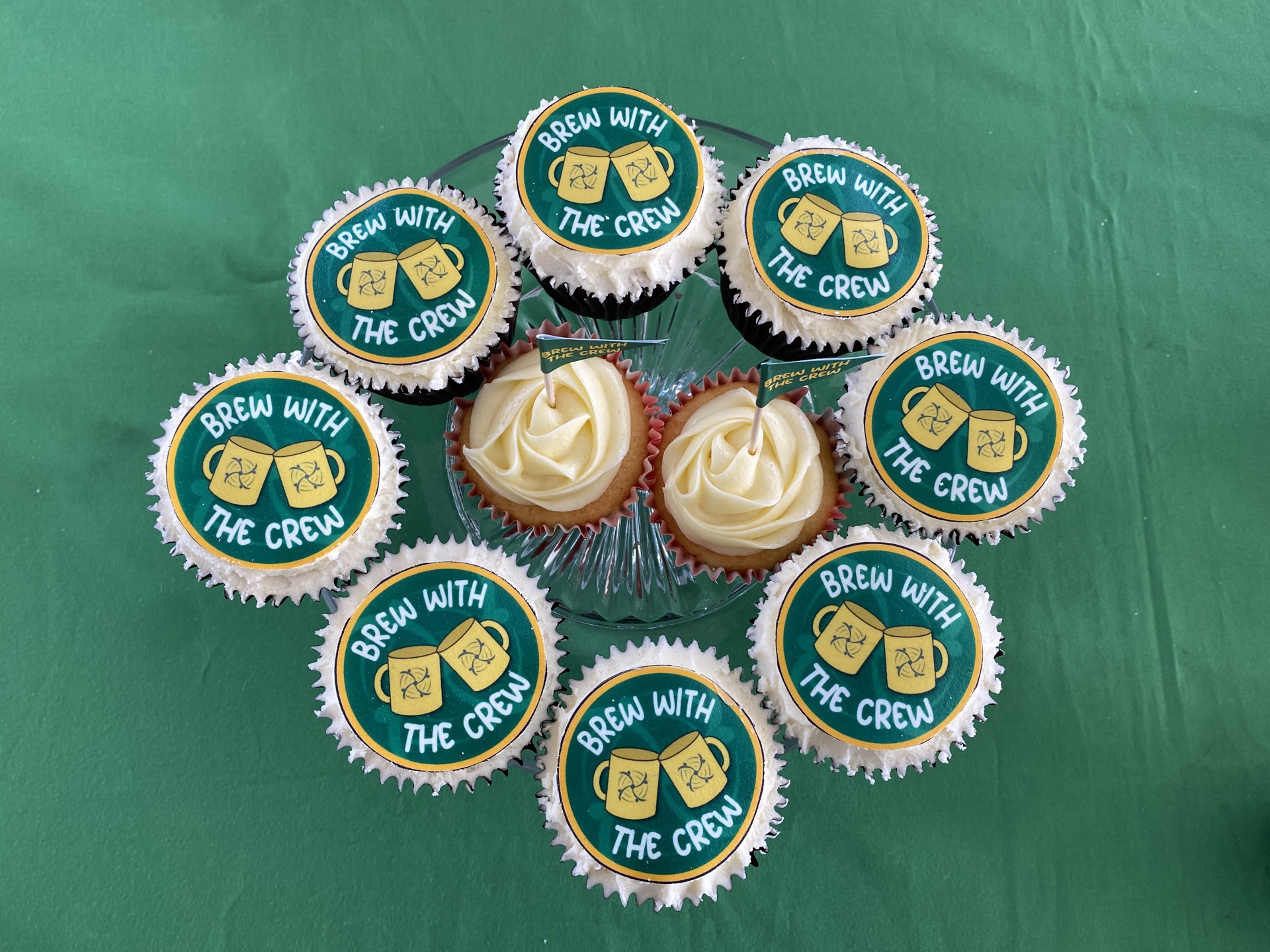 Cupcakes with Brew with the Crew logo cake toppers