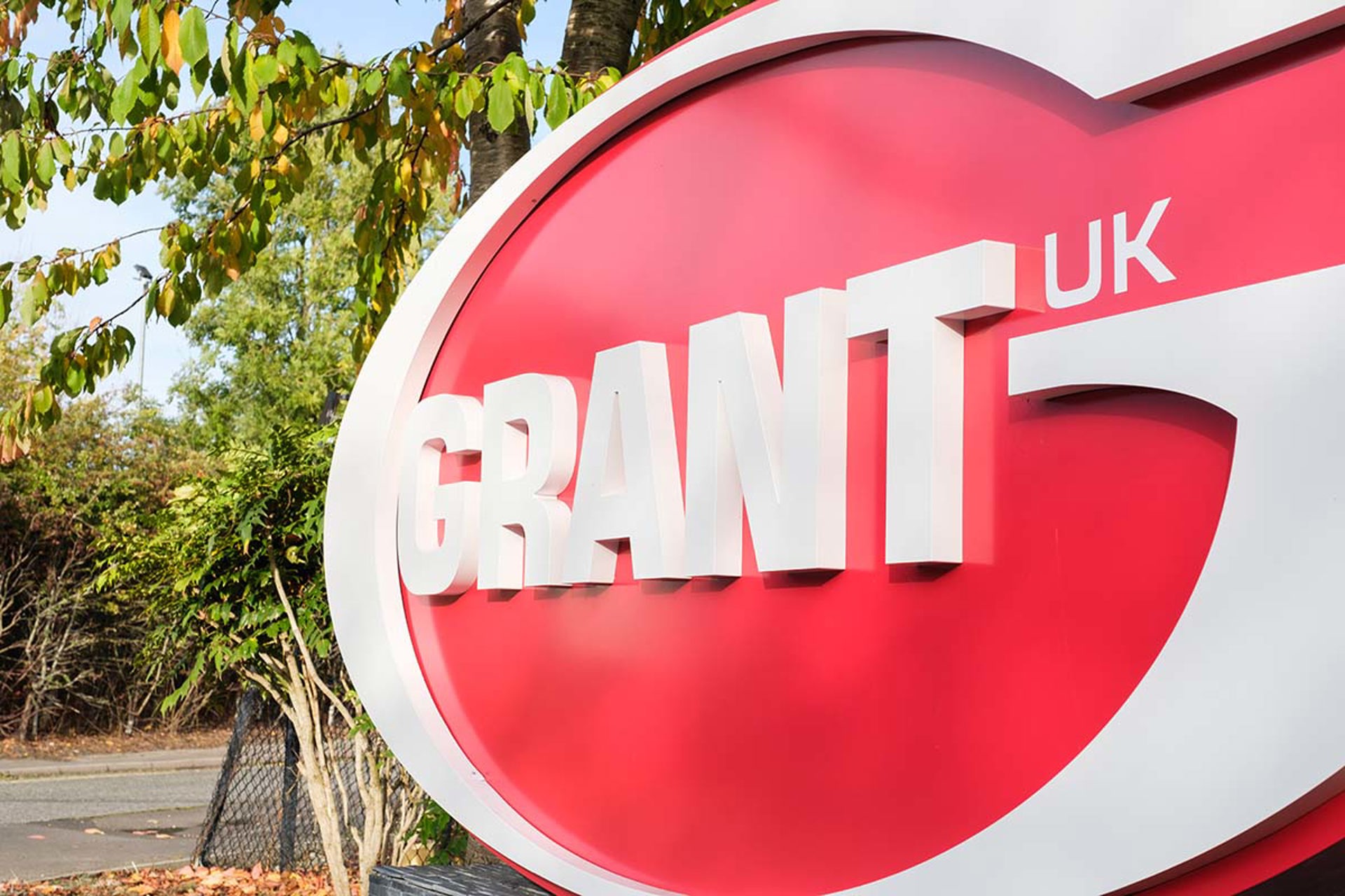 A red and white logo for Grant UK