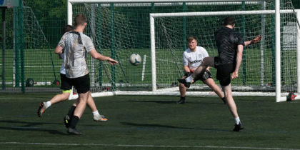 A football match between two teams from BT