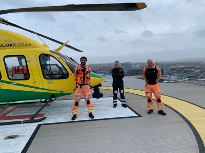 Wiltshire Air Ambulance helicopter landed on the Bristol Royal Infirmary helipad with critical care paramedic Adam Khan, pilot Elvis Costello and critical care paramedic Dan Tucker.
