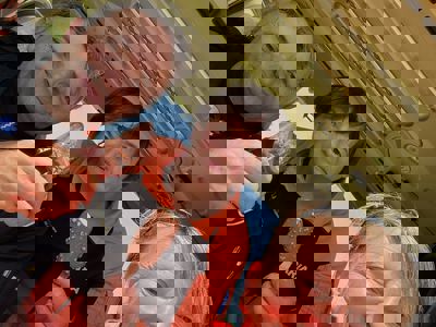 Pilot Matt Wilcock, Dr Maria Smith and Critical care paramedic Lou Cox with ice creams in the Wiltshire Air Ambulance helicopter