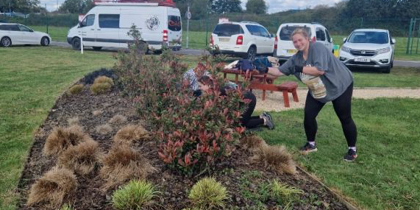 A member of Fexco staff volunteering at the airbase by gardening