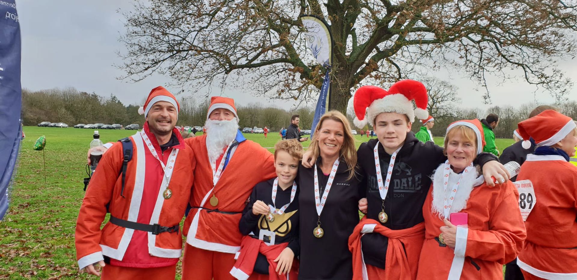 Ben Sibley and family taking part in the Santa Run event