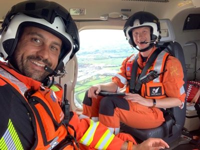 Critical care paramedics Adam Khan and Craig Wilkins taking a selfie mid-flight in the Wiltshire Air Ambulance helicopter.