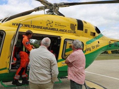 Paramedic Lou Cox showing heli to Mayor of Trowbridge